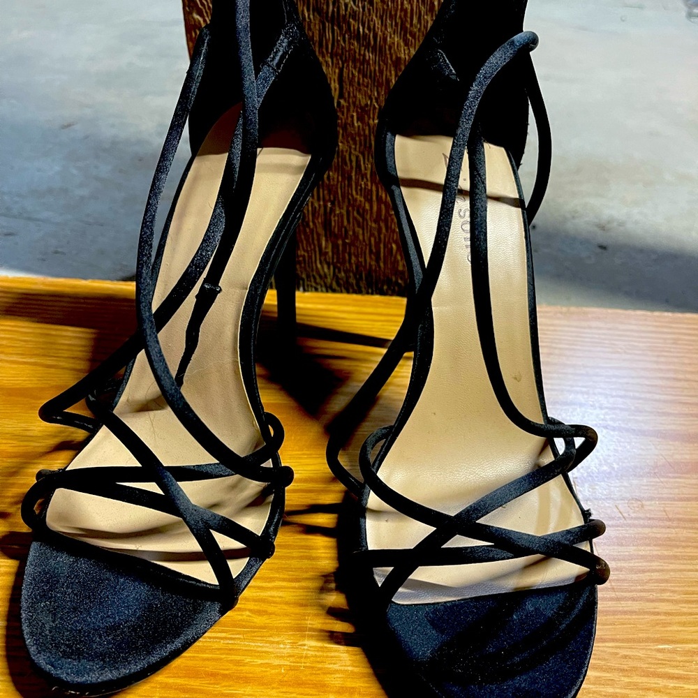 Black high strap stilettos